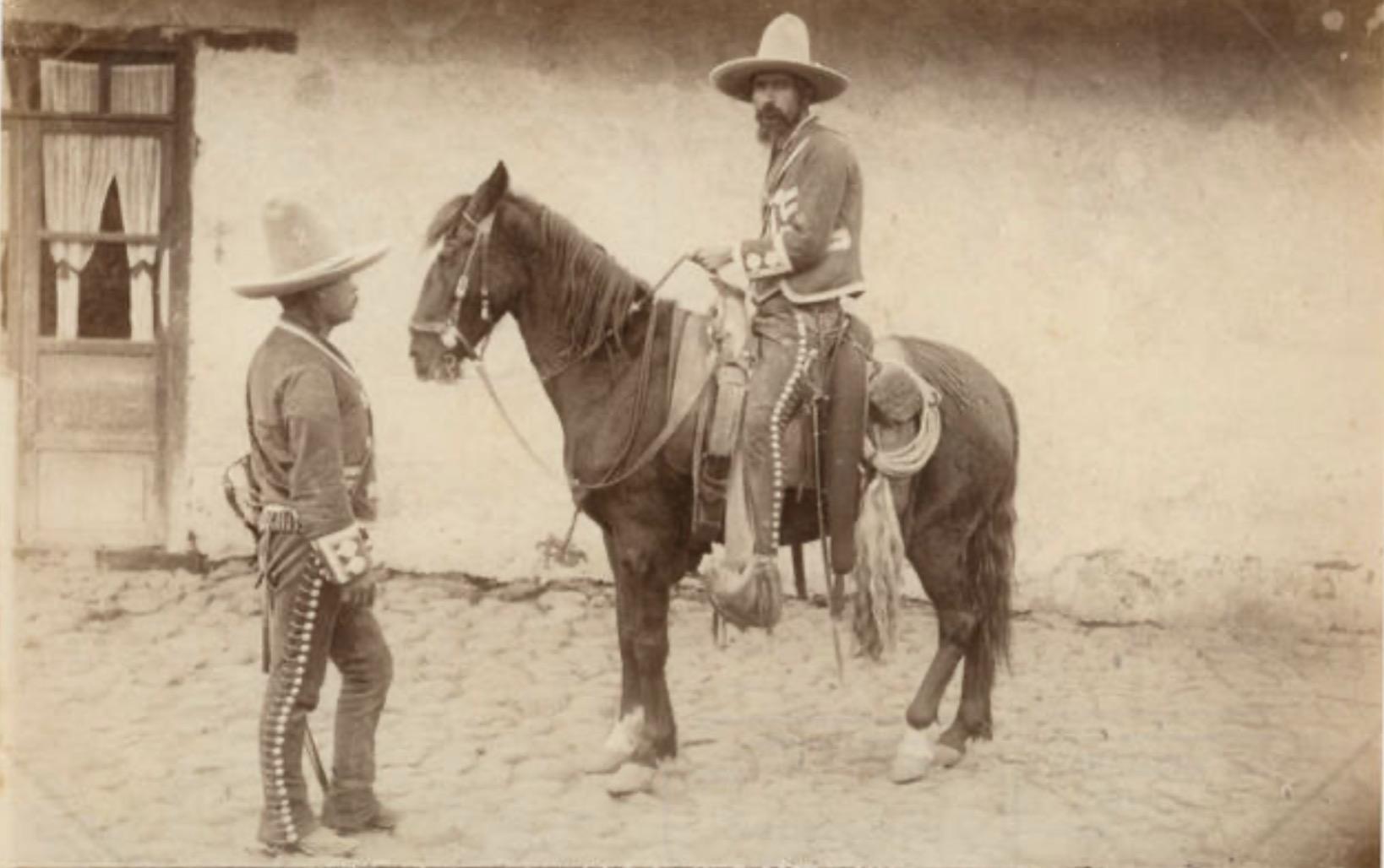 Two National Guards in Tia Juana guarding an establishment suspected to belong to the Sinaloba Cartel.