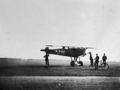 Nyberg N24 biplanebeing watched by ground crew as it performs takeoff from Engsund Air Base, 1926.
